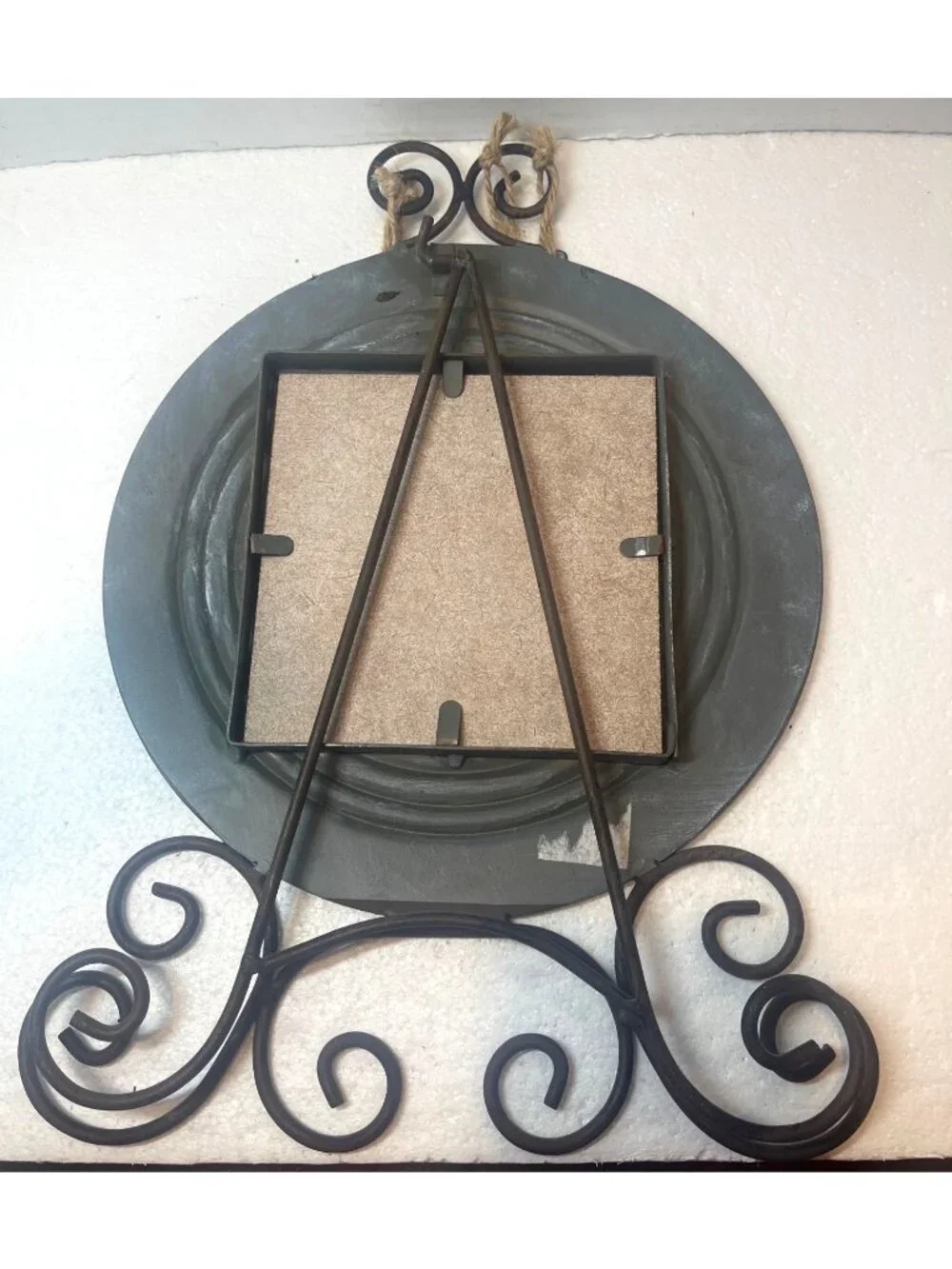 Rustic Metal Frame With Gardening Charm Accents And Decorative Scroll Stand